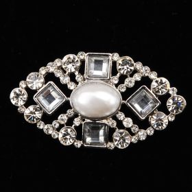 cystal brooch with center pearl