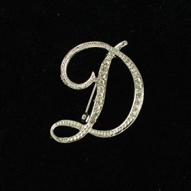 initial brooch D